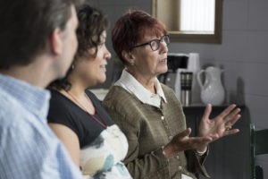 A woman expressing her opinion in a meeting