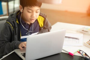 boy home learning