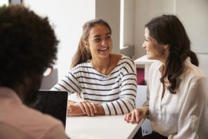young adult in a meeting