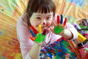 Girl with paint on her hands