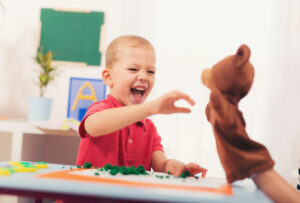 Child with a puppet