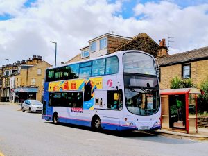Bus stationary at a bus stop