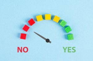 A loading bar with teh word no on the left and yes on the right with the dial arm pointing to No.